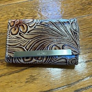 Patricia Nash tooled leather wallet.  Brown tooled leather.  Great condition.
